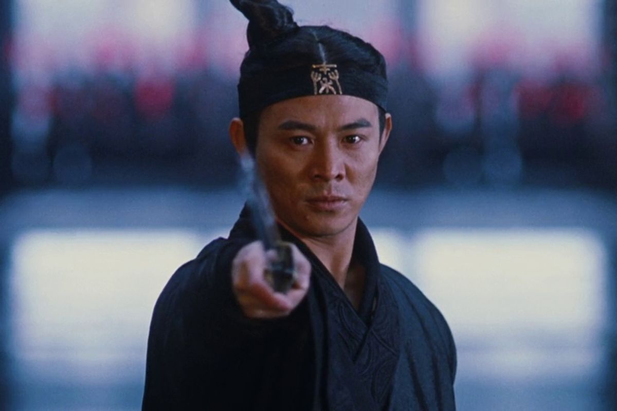 Jet Li points a sword at the camera in Hero