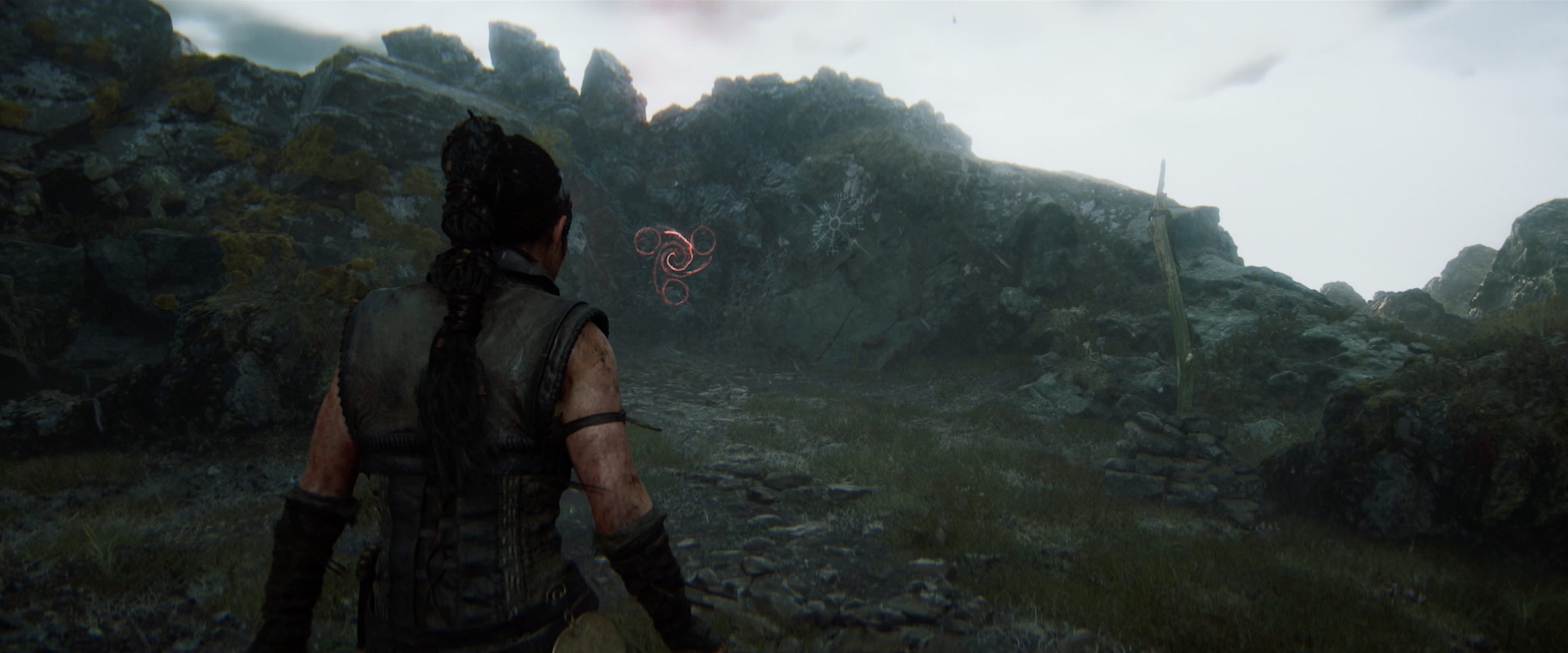 Hellblade 2 Senua approaching the rune gate near Bardorvik