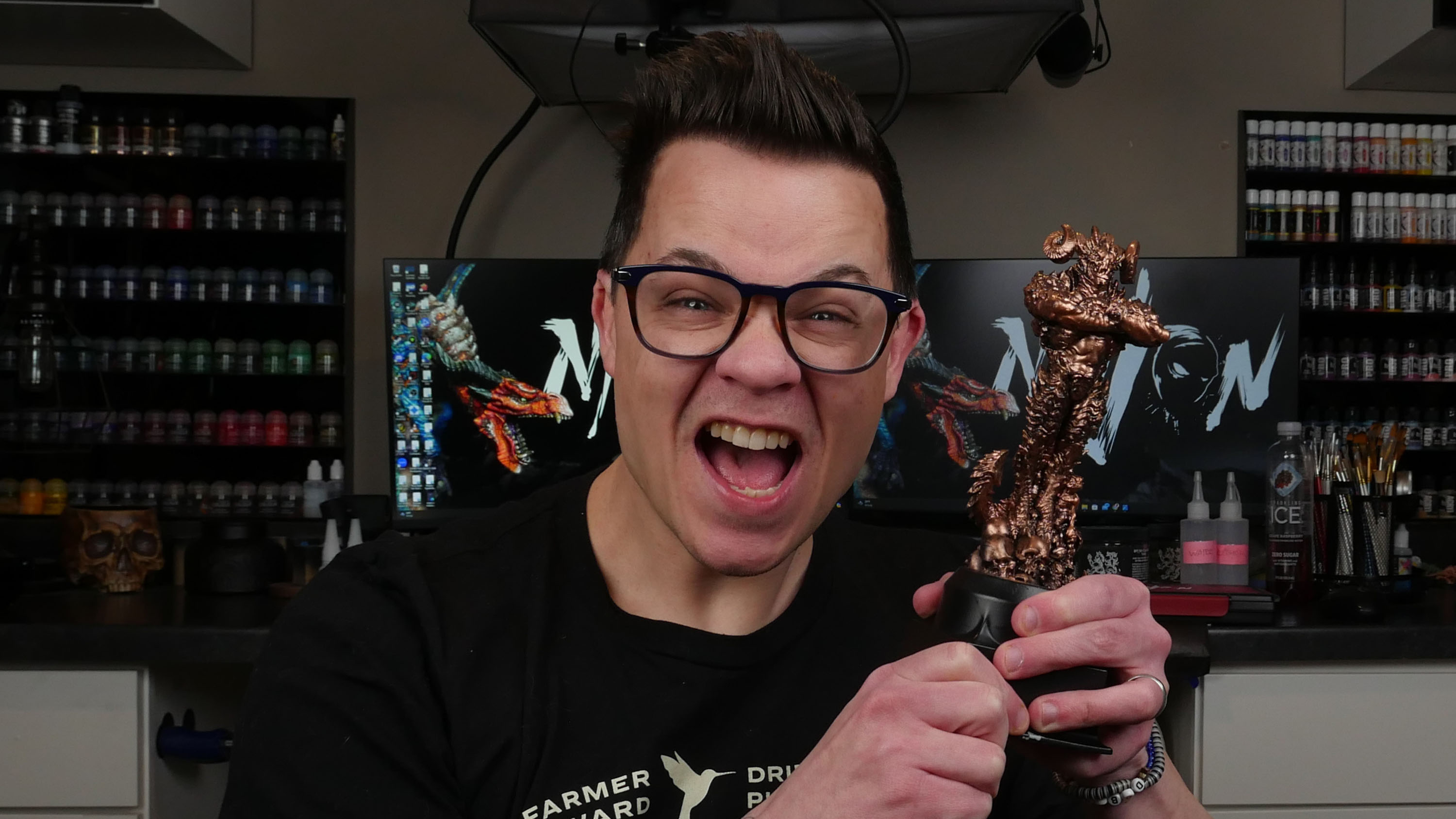 Jon Ninas with his bronze Golden Demon award.