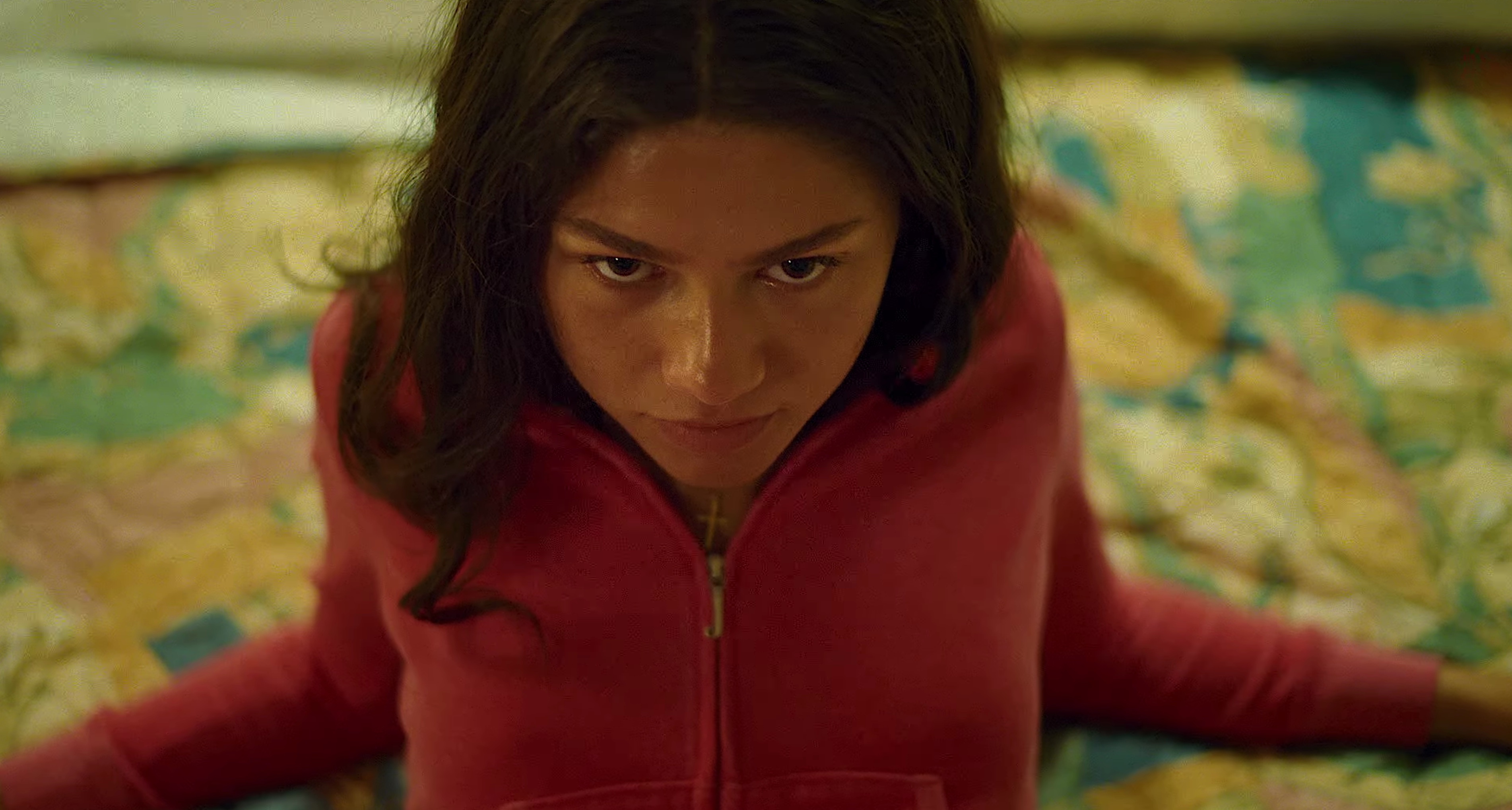 Teenage tennis champion Tashi (Zendaya) leans back on a hotel bed and stares lustily up at the camera in Challengers